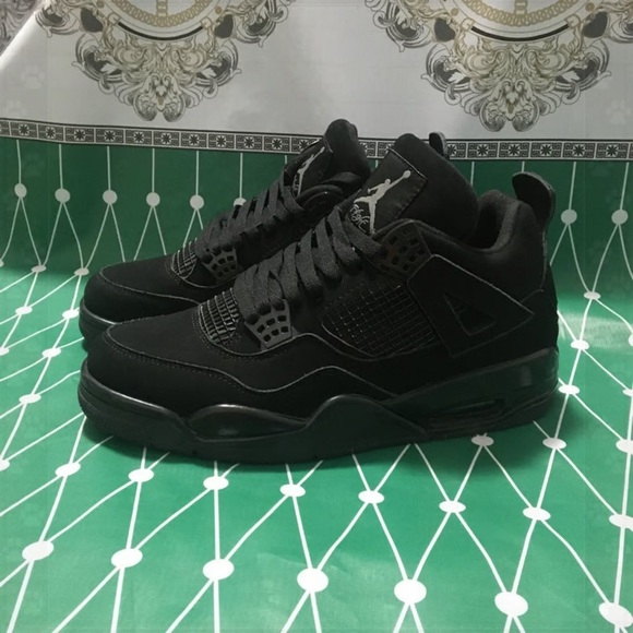 Jordan Other - Nike Air Jordan 4 Retro Black Sneakers